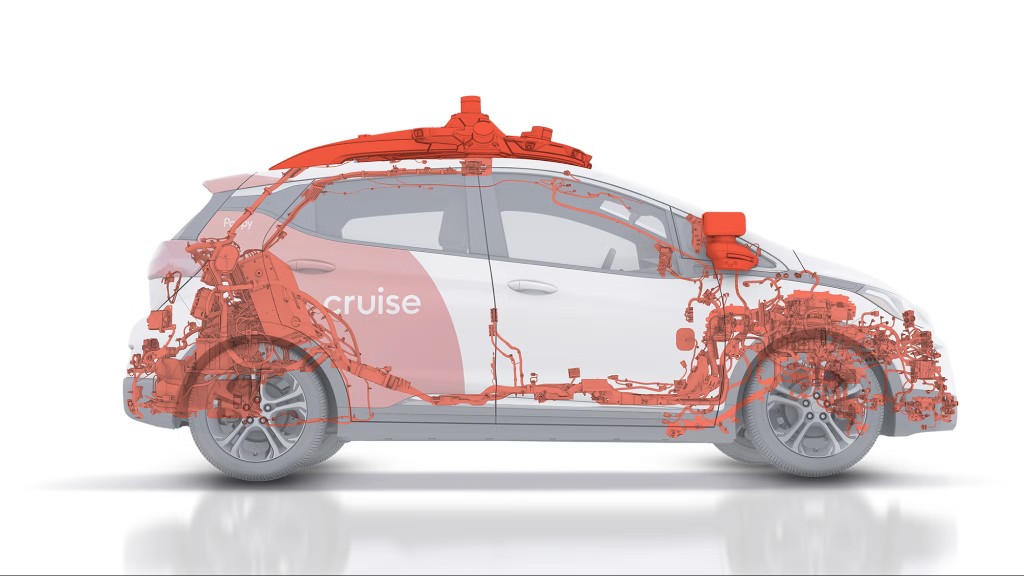 Cruise Chevrolet Bolt showing the additional orange hardware needed to convert an EV into an autonomous vehicle